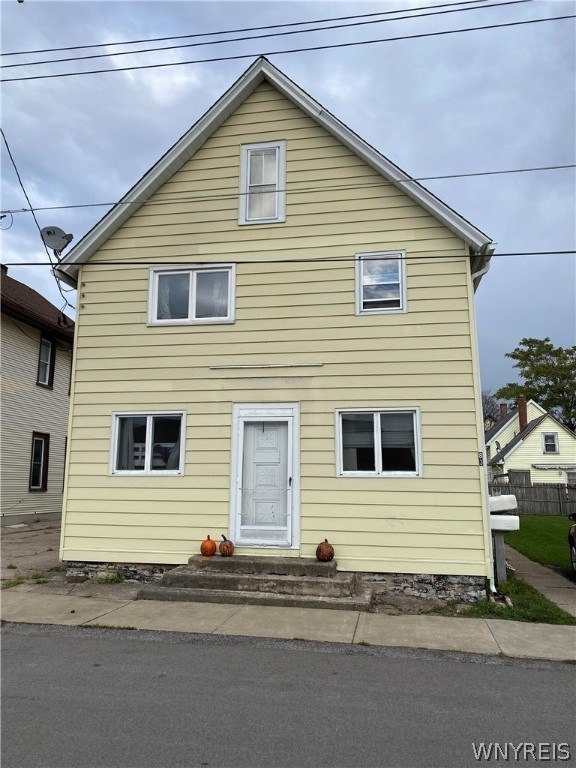 Vinyl sided home with double lot to the right!  Ov
