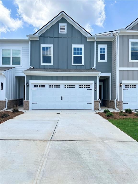 View of front of home with board and batten siding