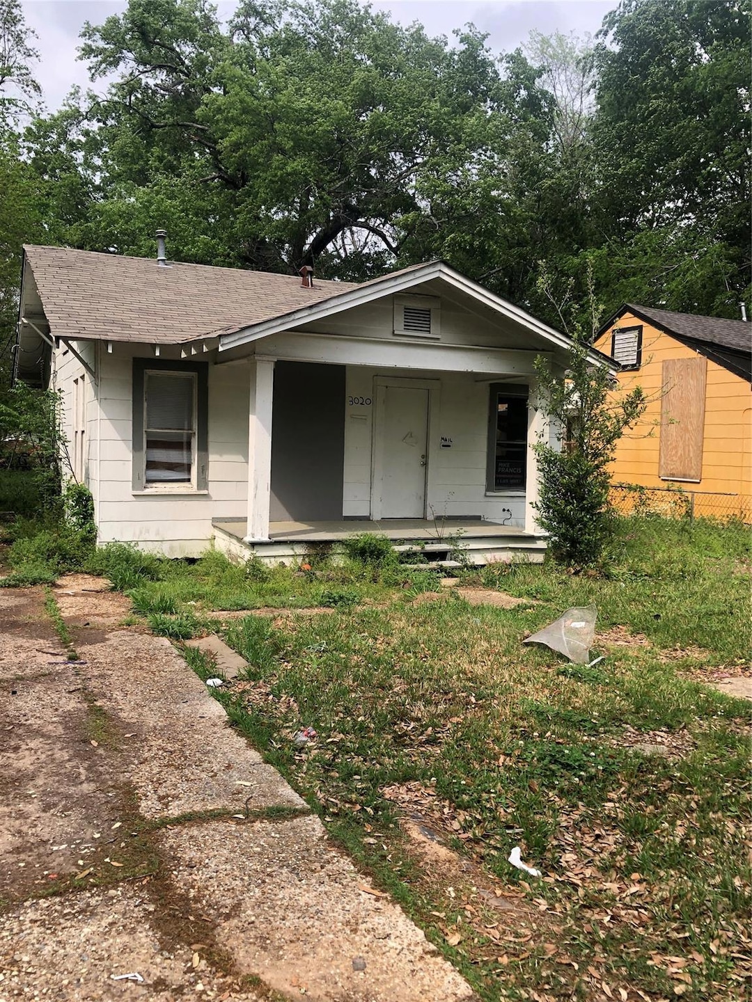 Bungalow-style home with a porch