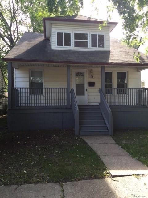 Front of house with nice fresh painted porch