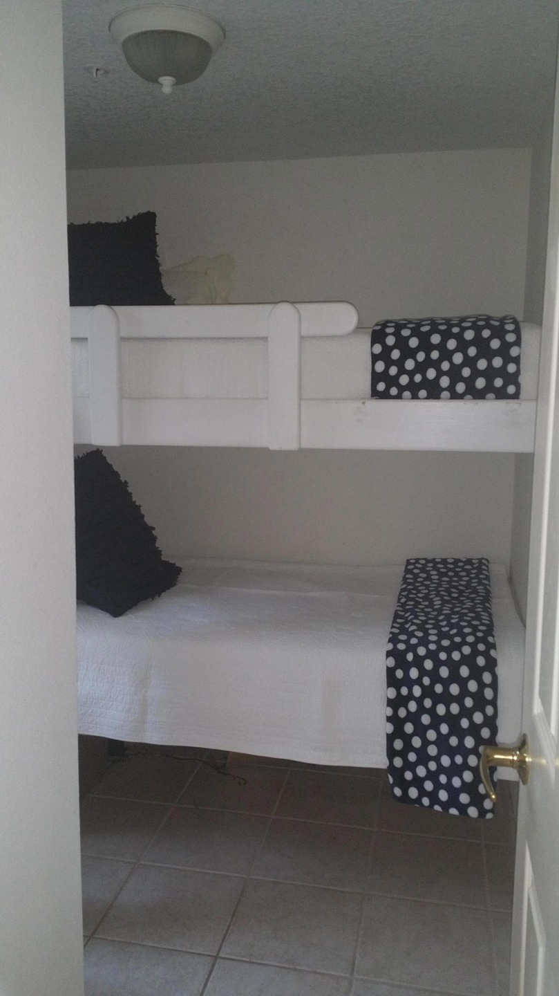 Bunk room with door