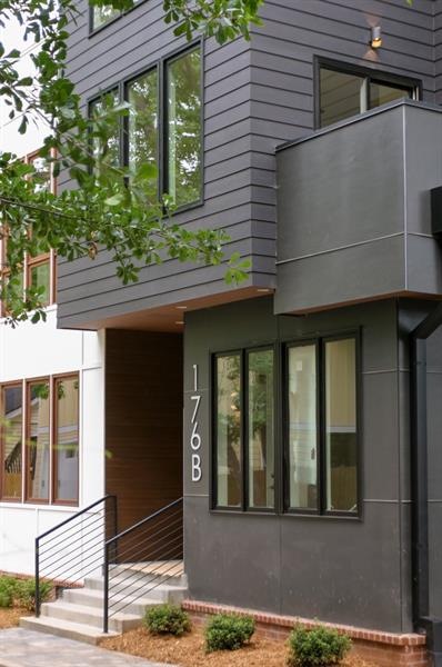 Enjoy this three-story townhome in the heart of th