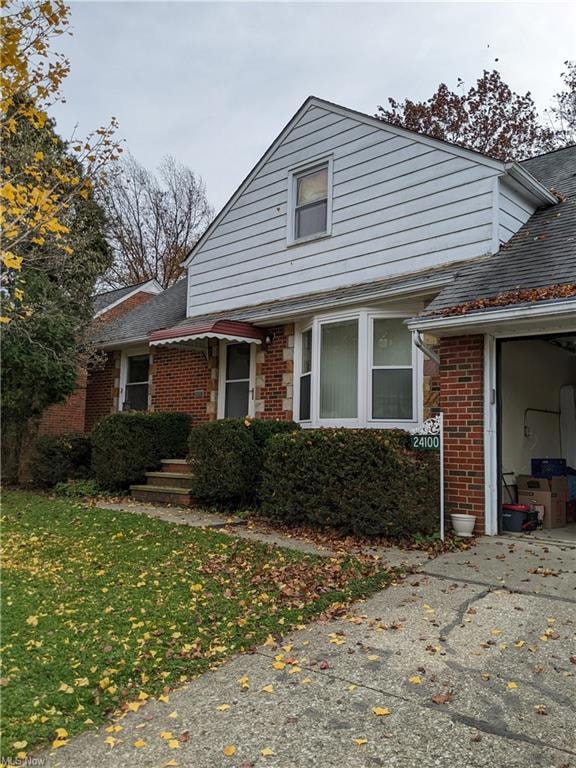 Front of house with attached garage