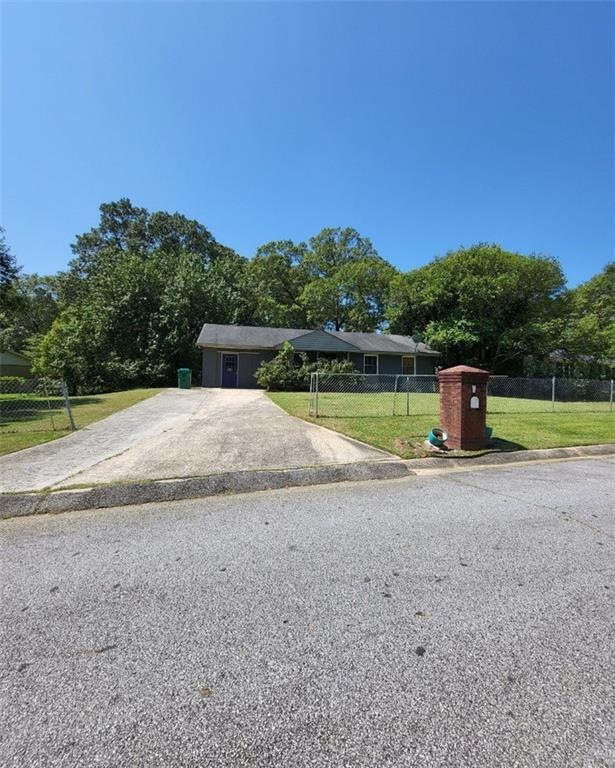 LARGE FRONT YARD. FENCED. AMPLE PARKING.