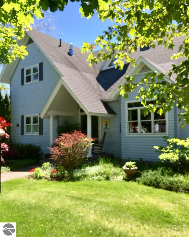 318 Cedar St, Elk Rapids, MI 49629 - photo 1