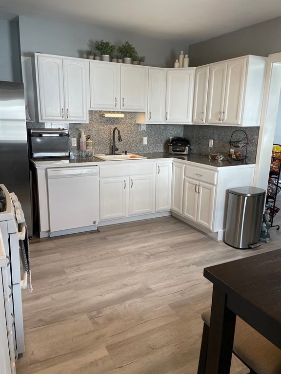 215 Adams St unit 217, Newton, MA 02458 - photo 1