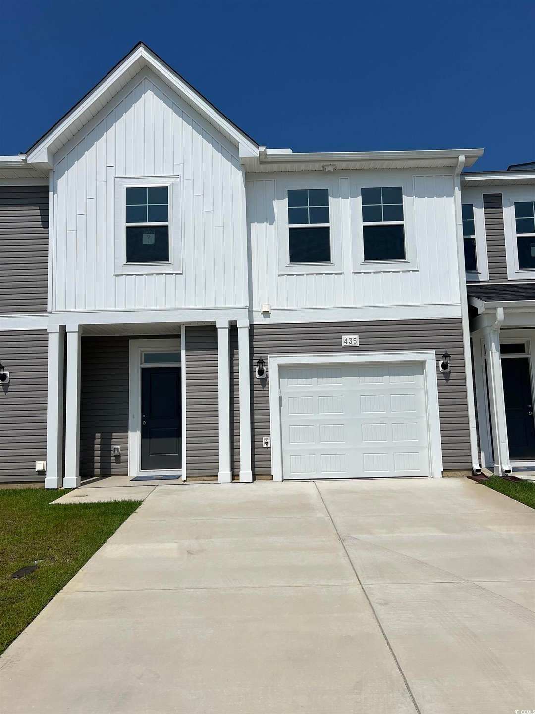 View of front of home featuring a garage