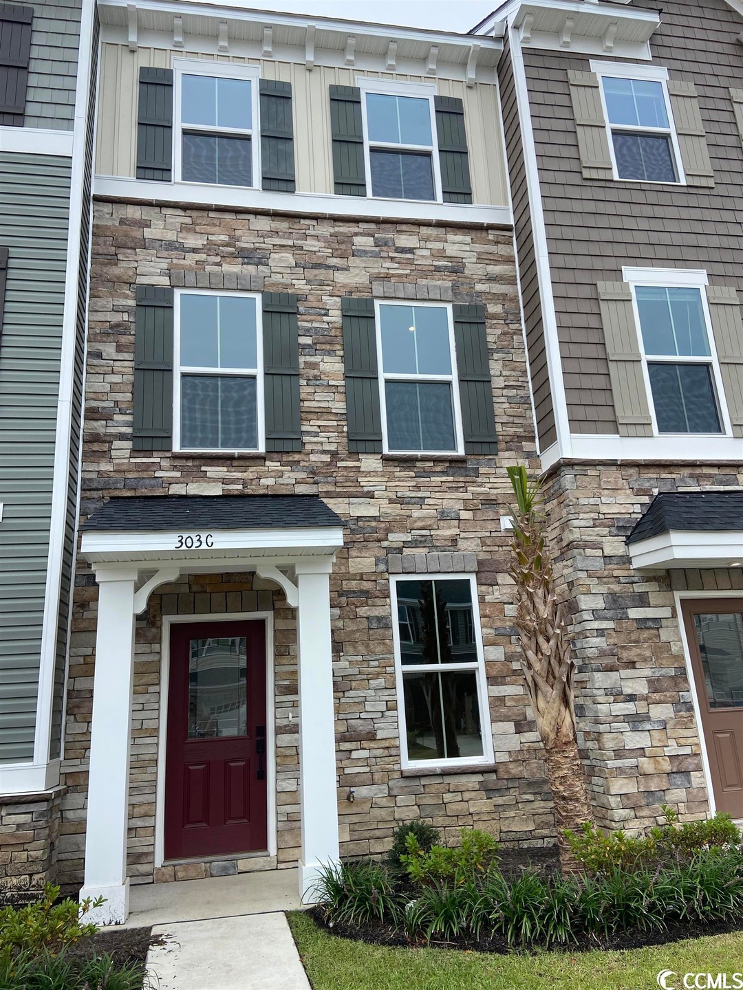Craftsman-style exteriors with stone, siding, and 