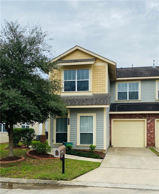 Beautiful end unit townhome with one car garage.