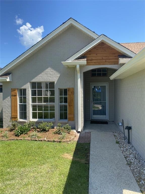 Beautiful wood accents on front of home