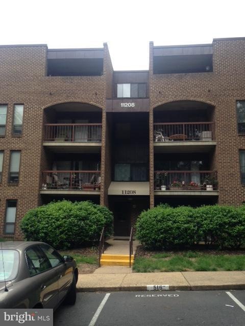 11208 Chestnut Grove Square unit 209, Reston, VA 20190 - photo 1