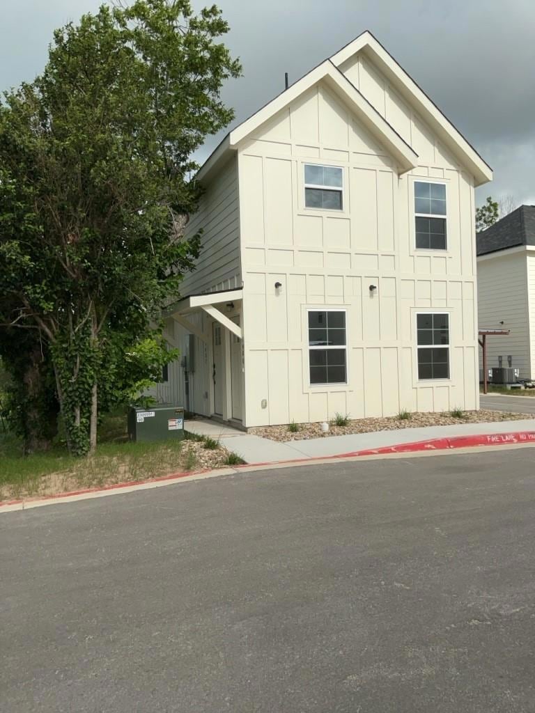View of front of home featuring board and batten 