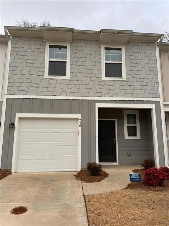 Multi unit property featuring a garage