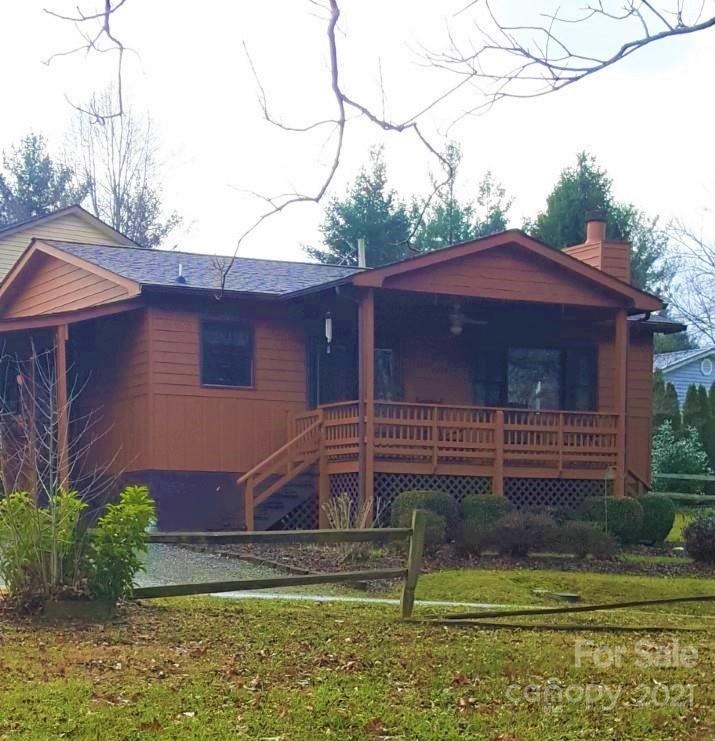Enjoy the covered front porch and the mountain views from this well maintained home.