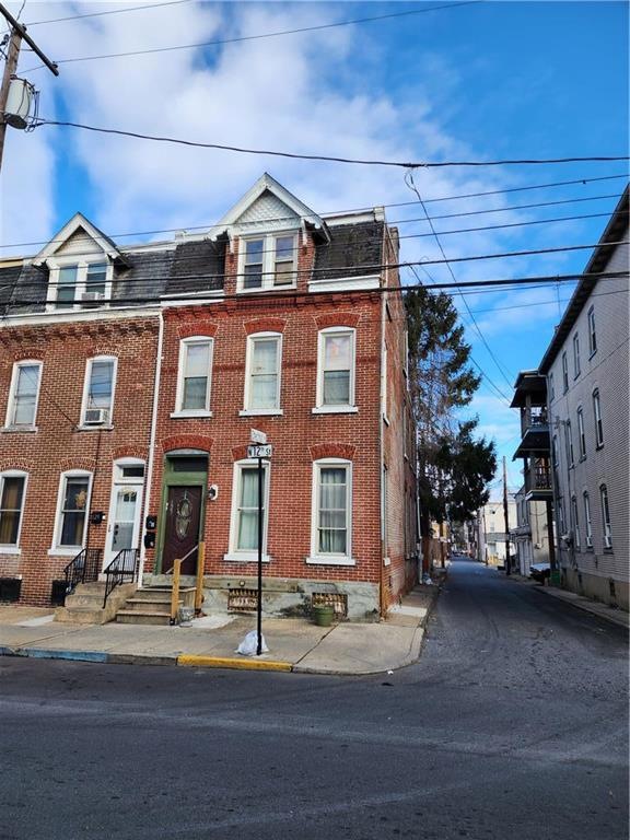 Front- Corner Brick home