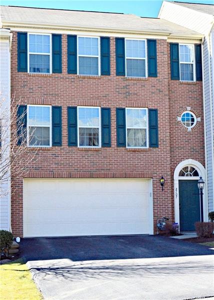 Welcome home to this gorgeous brick townhome!