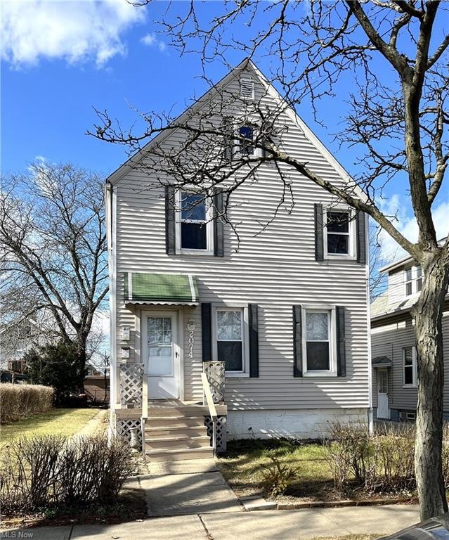 Great investment property!  Two units in front house with additional two bedroom house in back.