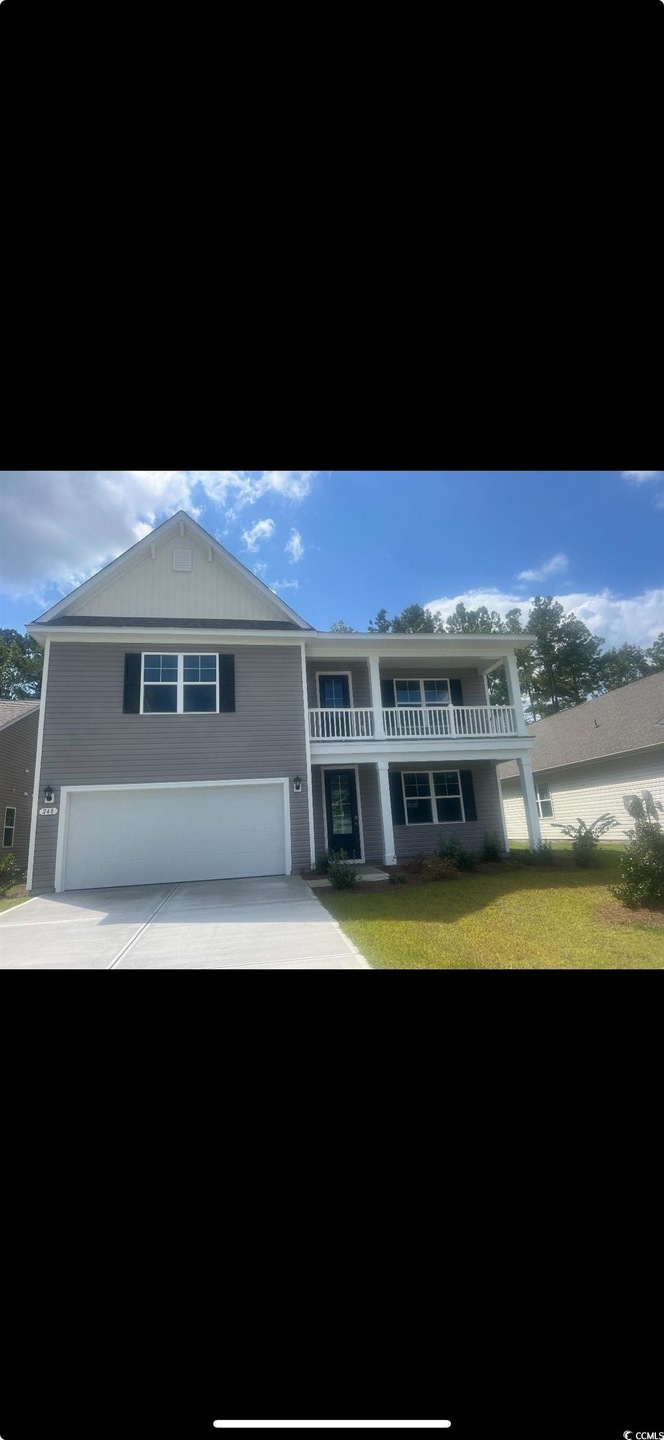 View of front of property featuring a front yard