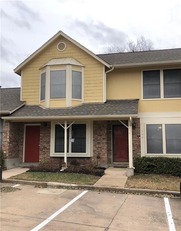 Front view - unit #122 is the door on the right.