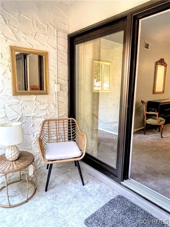 Interior space featuring a patio area