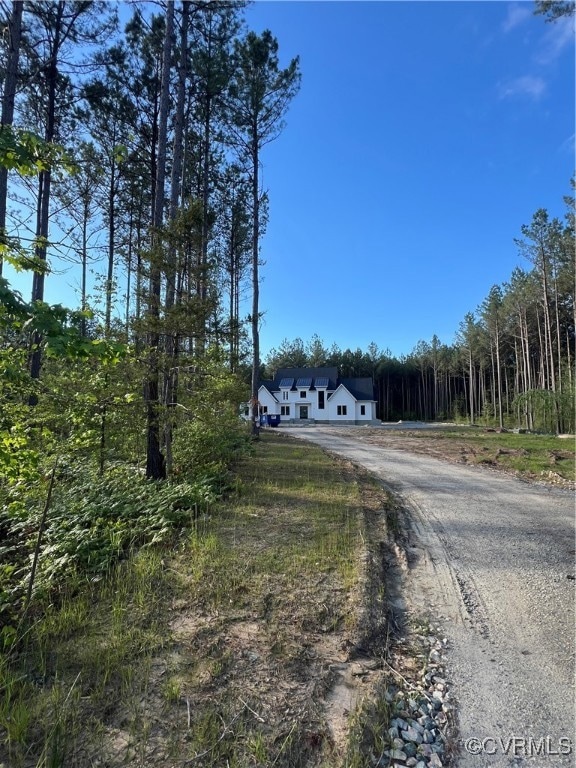 House Sits Down a Long, Private Drive