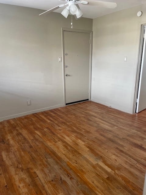 Wood floors in living room and bedroom
