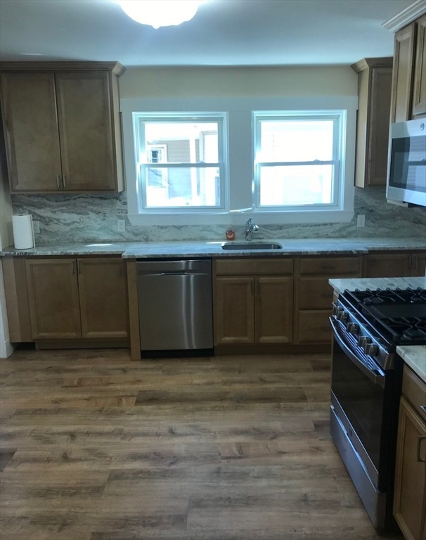 212 Robbins St unit 212, Waltham, MA 02453 - photo 1