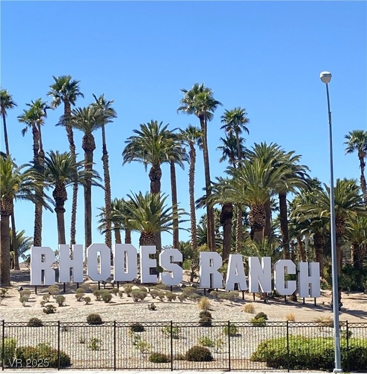 Community sign with fence