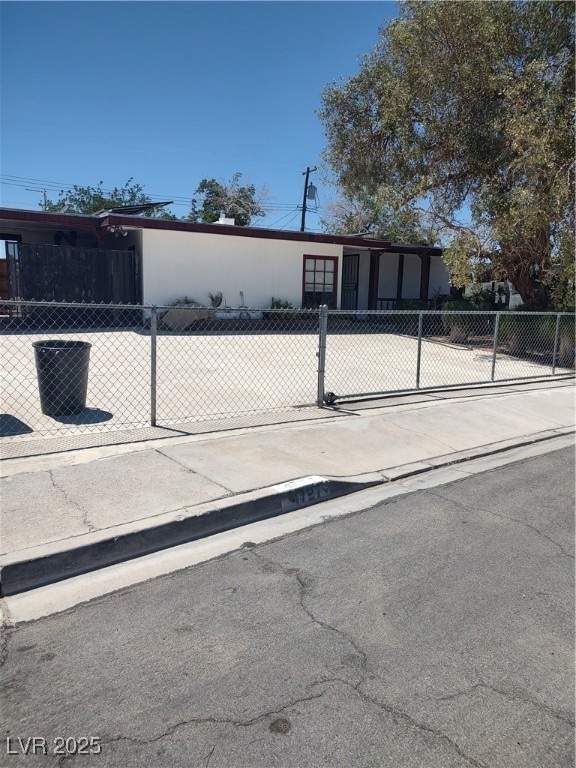 View of front of property with a fenced front yard
