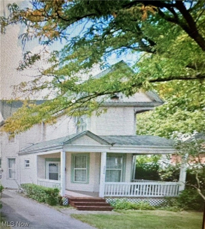 View of front of property with a porch