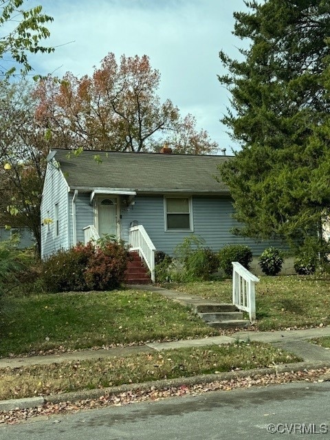 View of front of home with a front lawn