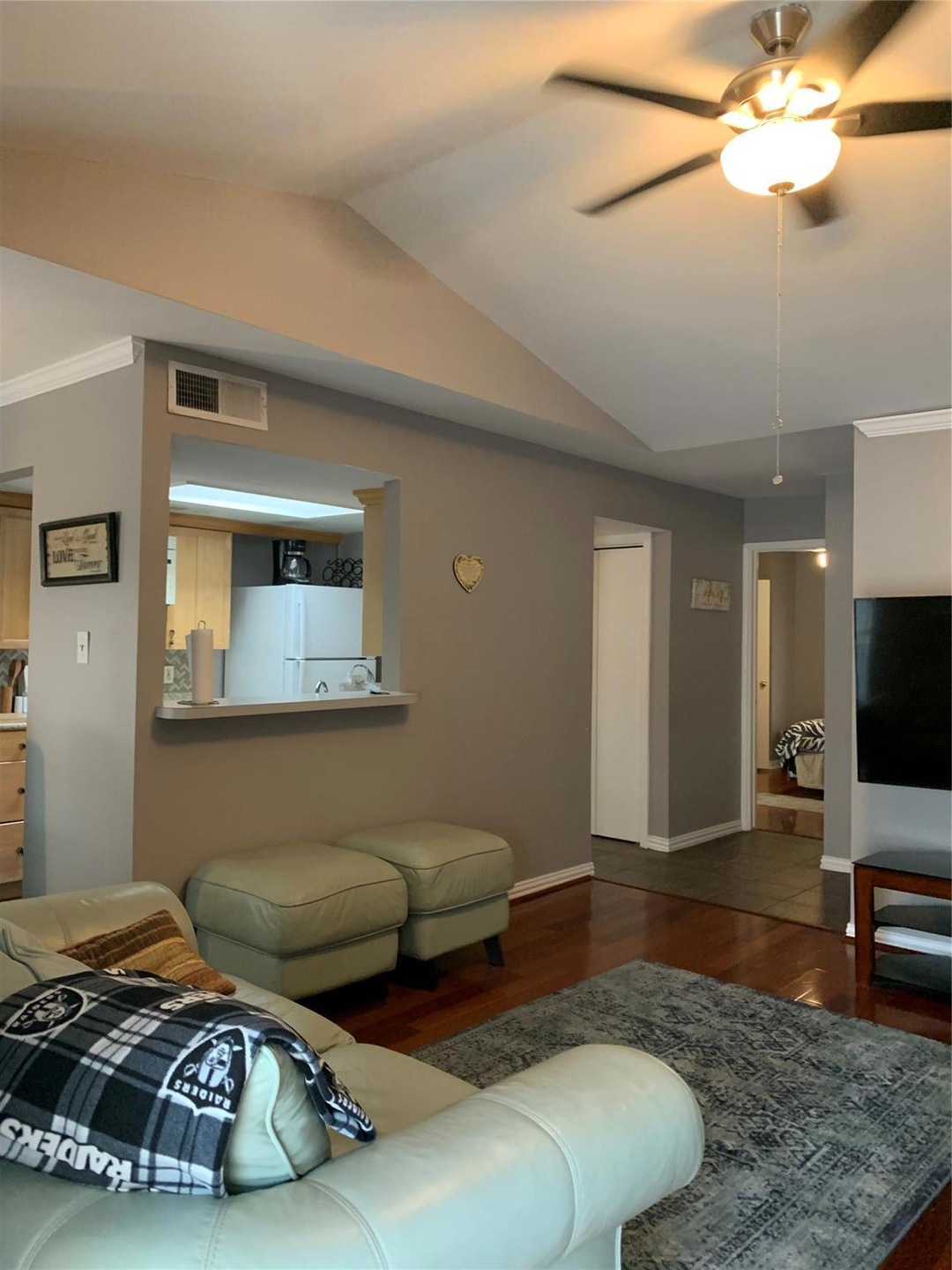 Living room with vaulted ceiling