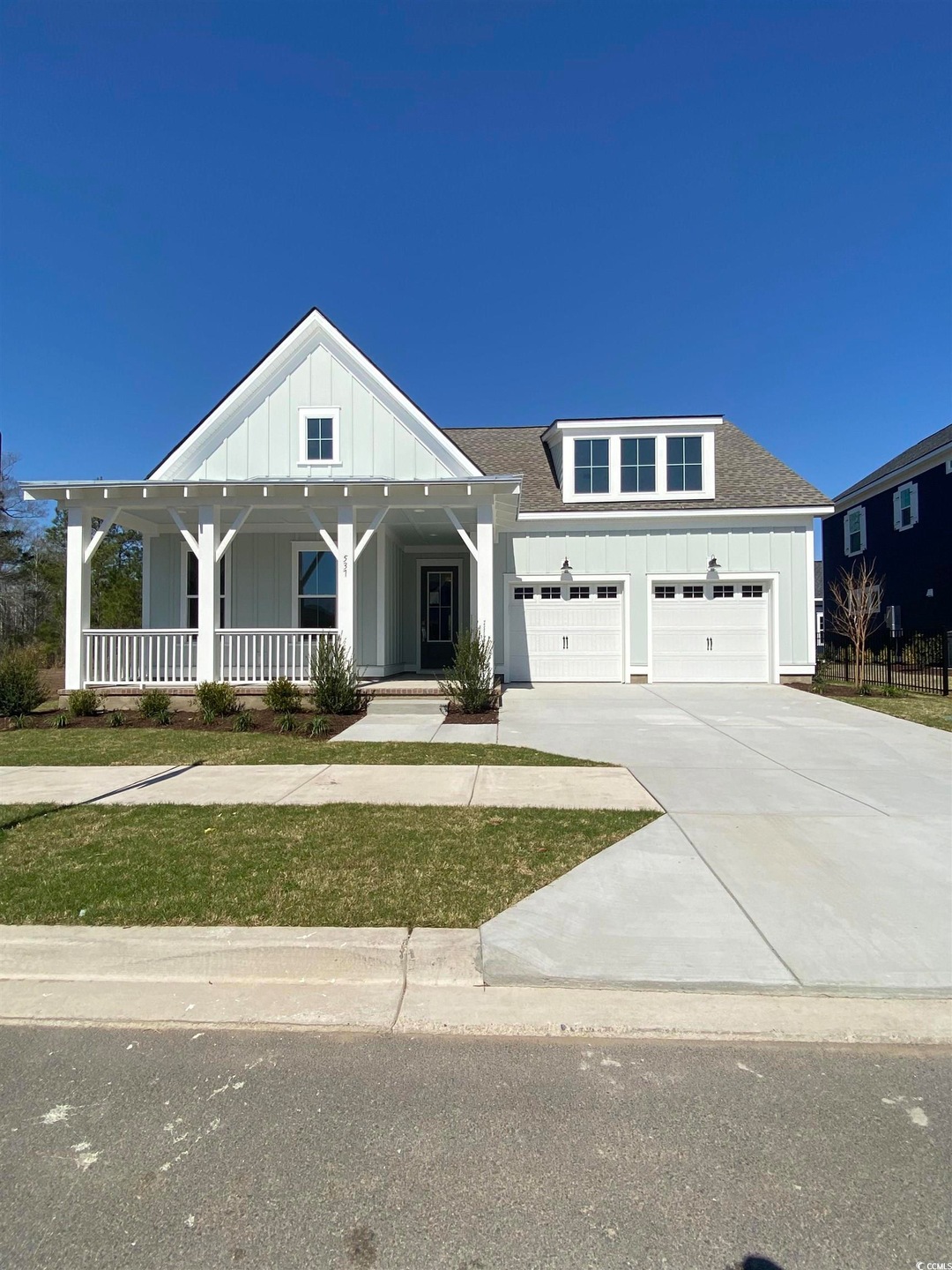 View of front of property featuring covered porch,