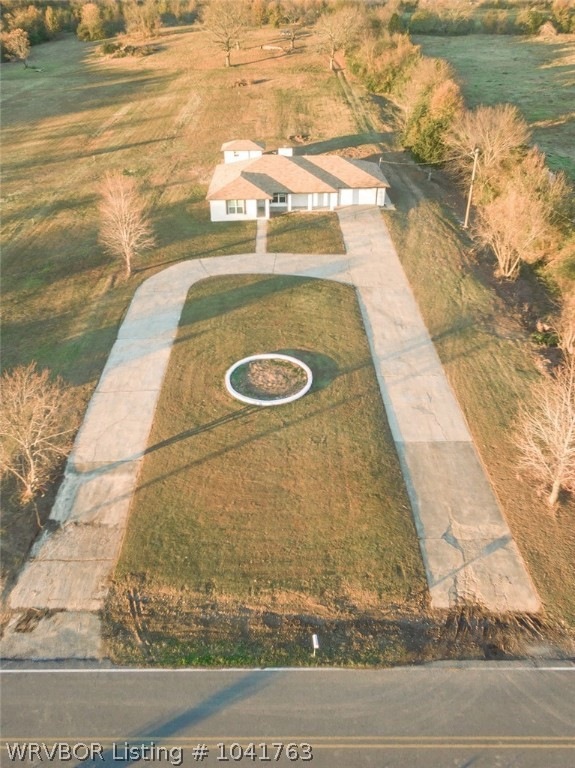 This home features a huge circle drive for a big family and lots of parking!