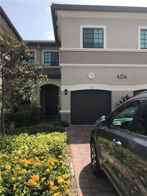 Front of unit with extra long driveway