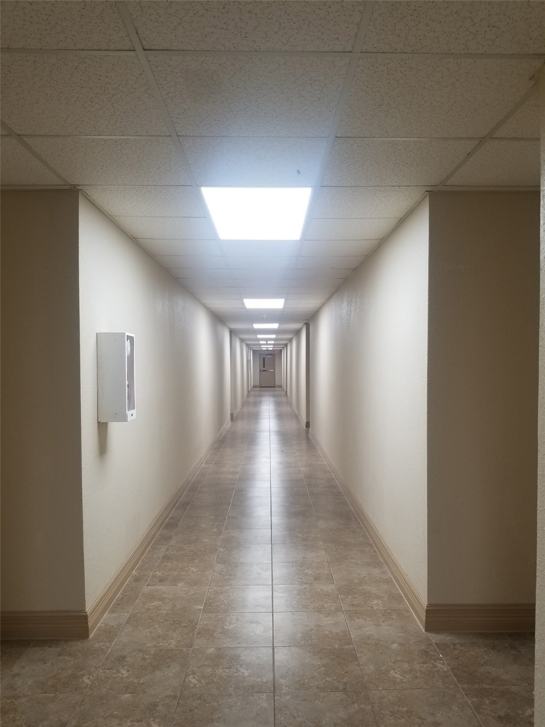 Unit is to the left. there are 6 condos in each fl