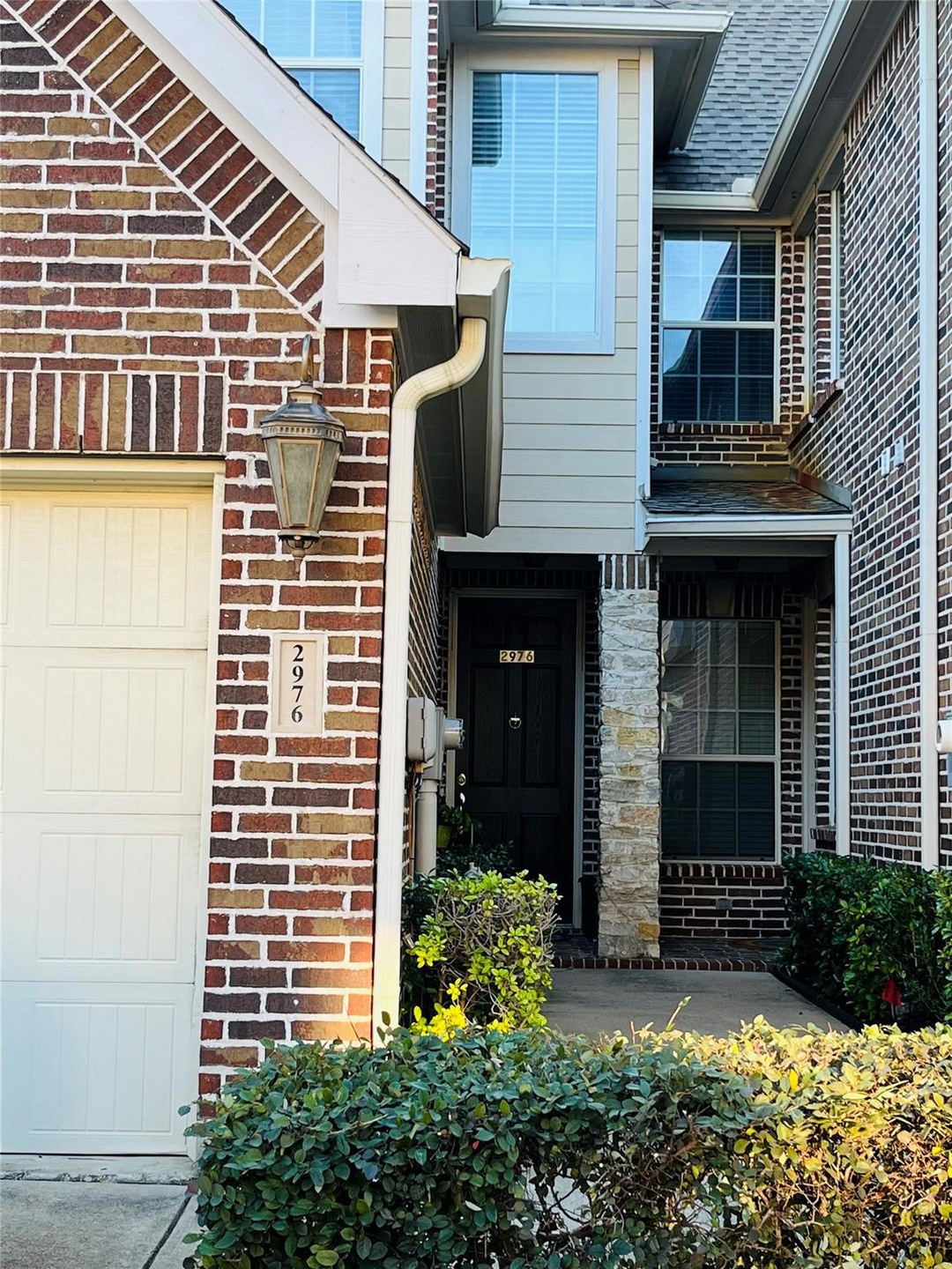 Property entrance featuring a garage