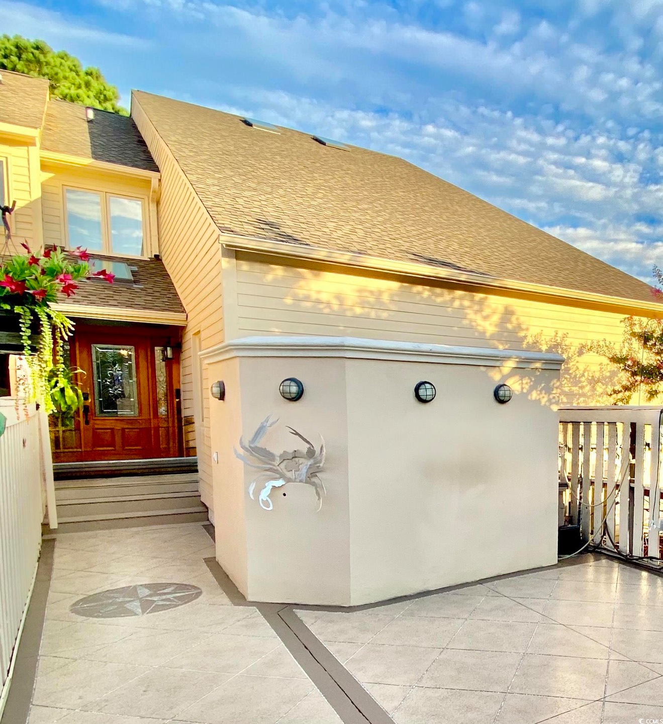Exterior space with roof with shingles