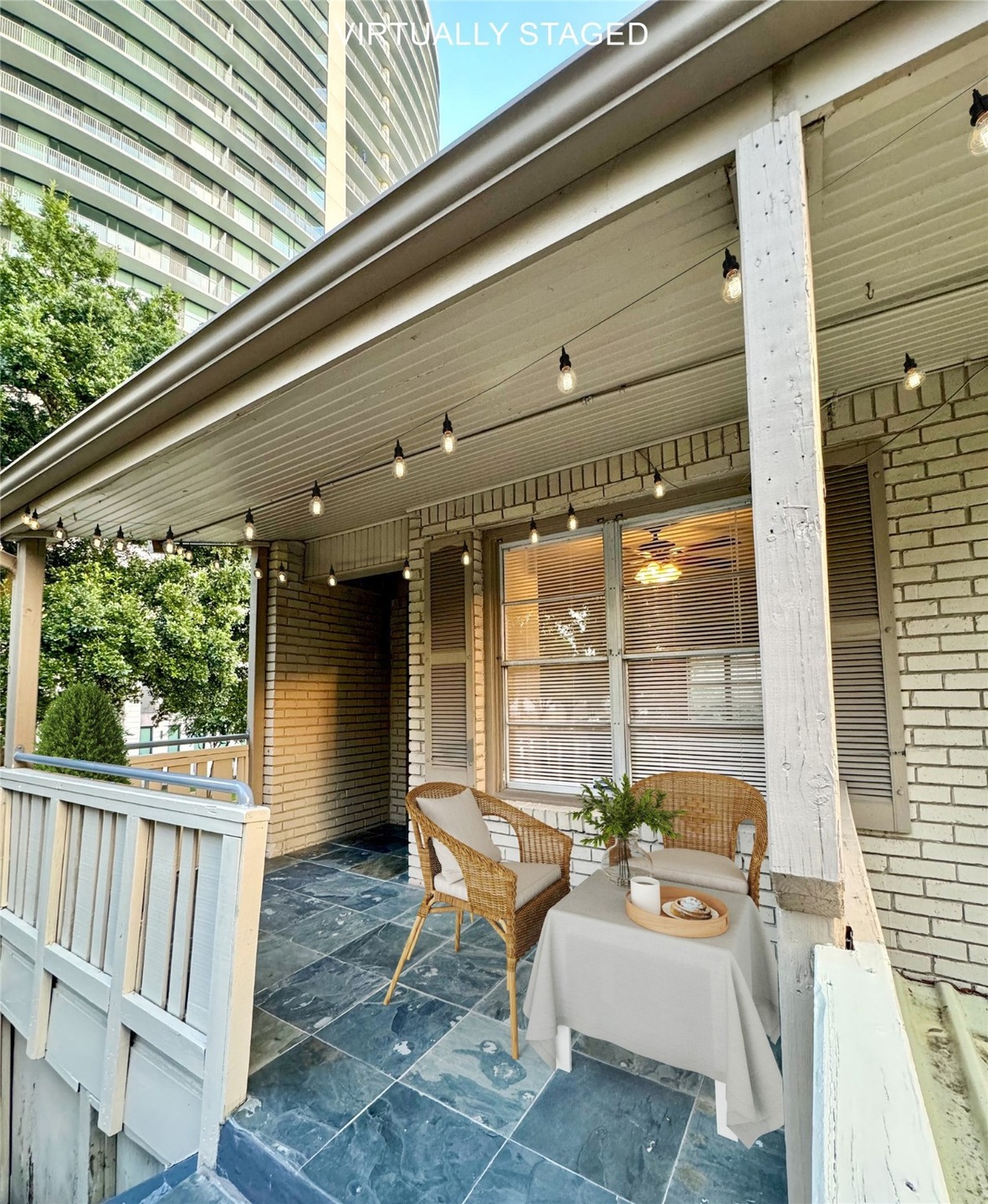 Welcome to 3202 Lake #3. Covered patio perfect for
