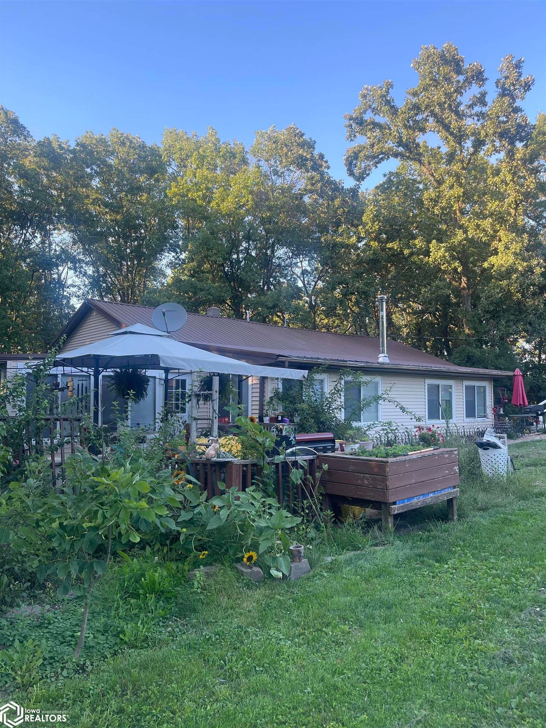 Showing raised garden and side deck/gazebo