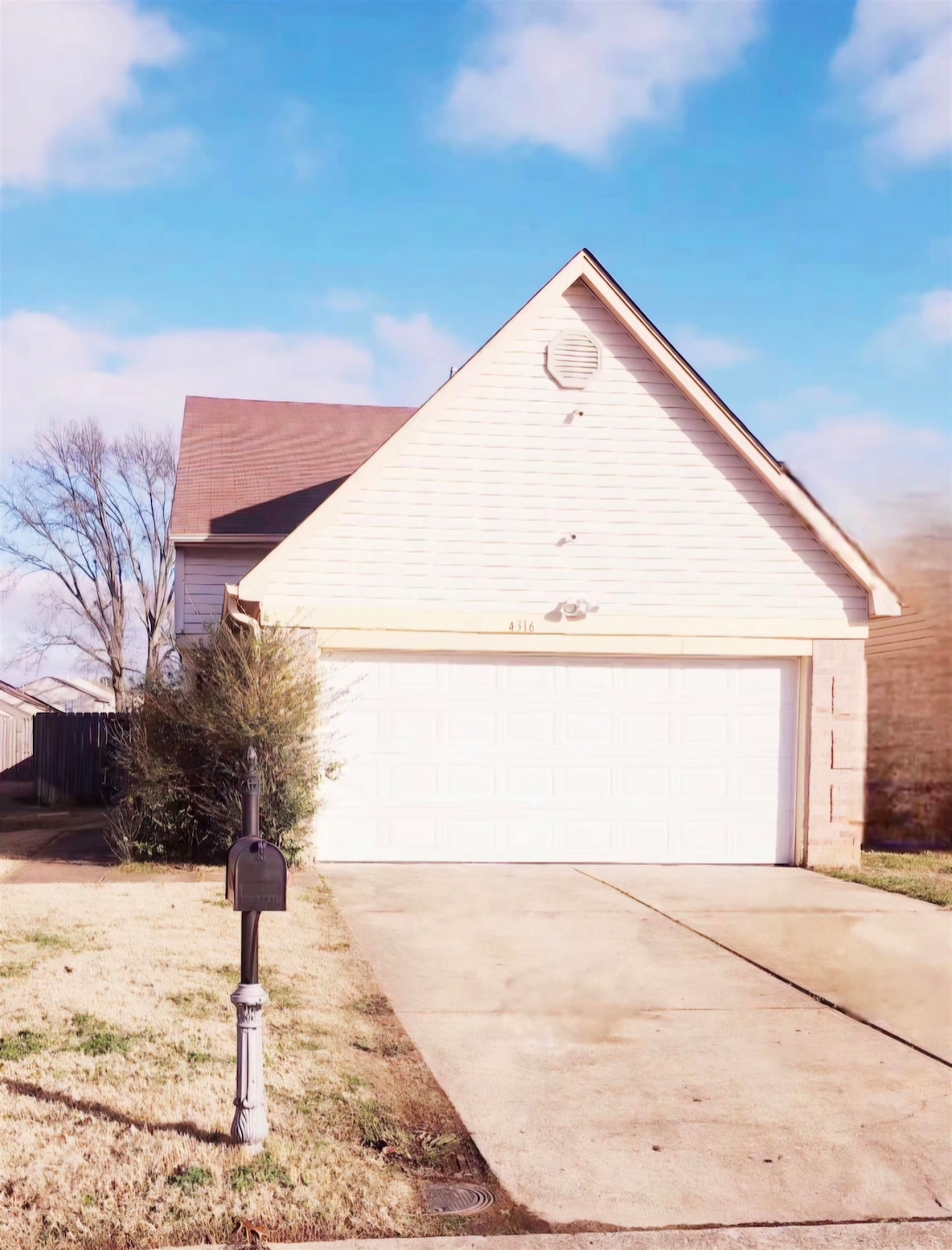 View of front of property featuring a garage