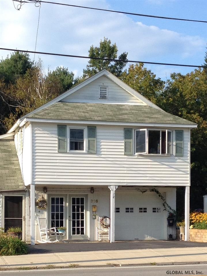 316 W Maple St, Corinth, NY 12822 - photo 1