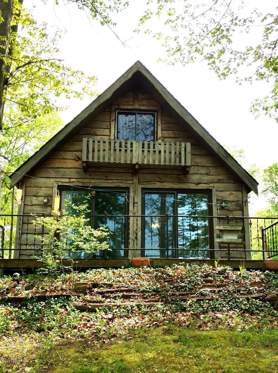 319 Harbison Dr, Bitely, MI 49309 - photo 1