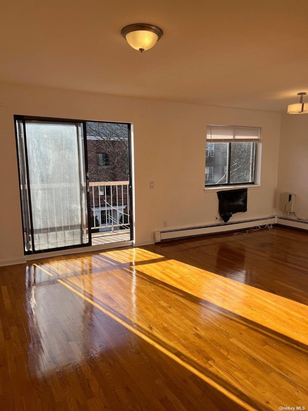 39-15 Corporal Stone St unit 3rd Fl, Flushing, NY 11361 - photo 1