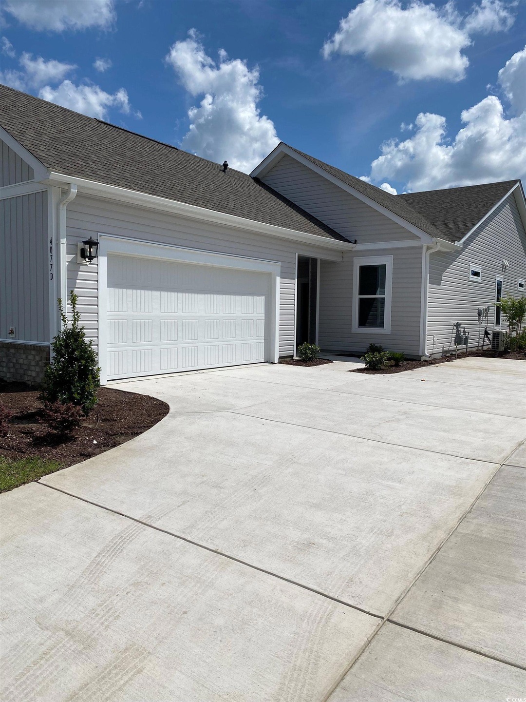 Ranch-style house with a garage