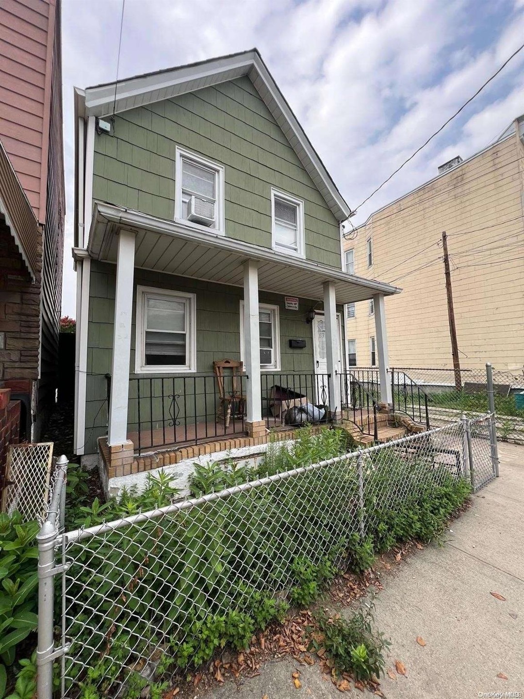 87-11 97th Ave, Jamaica, NY 11416 - photo 1