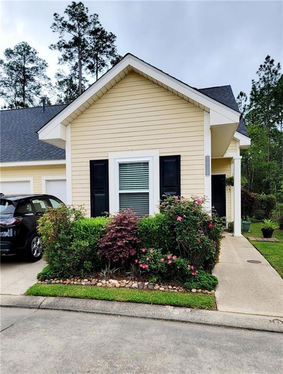 Front with 1 car garage