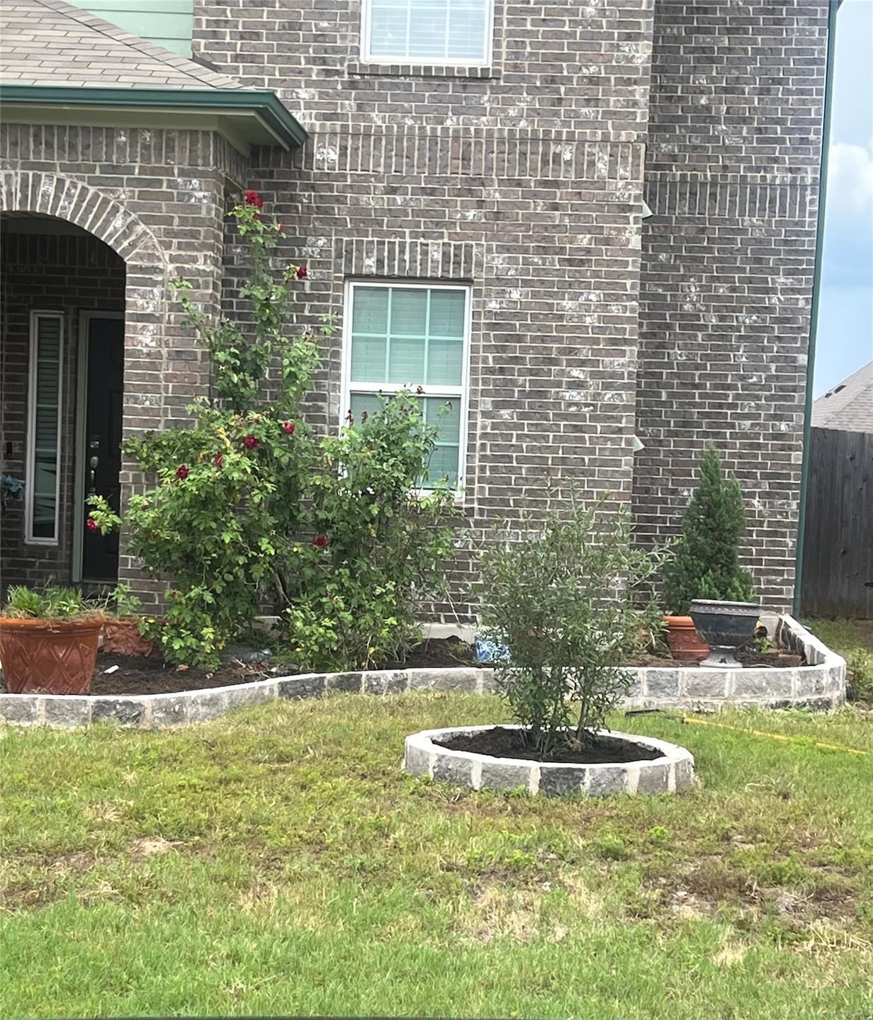 View of home's exterior featuring brick siding
