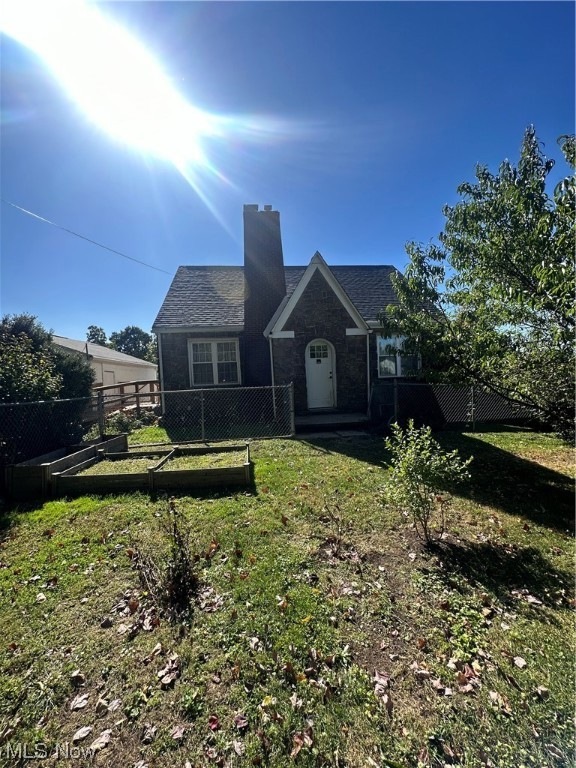 View of front of home with a front lawn