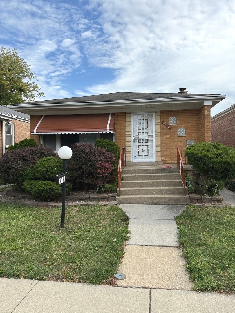 9741 S Lowe Ave, Chicago, IL 60628 - photo 1